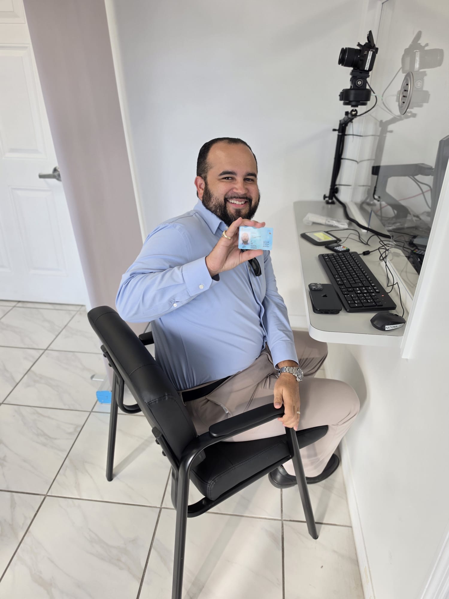 Minister DaCosta made history as first person to officially receive his eID on Cayman Brac